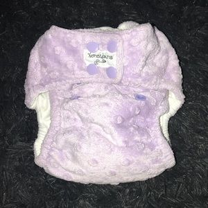 A purple cloth diaper